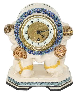 Bild Nr.1: 121-1657 Karlsruher Majolika Figurenuhr: (Porzellan u. Keramik)