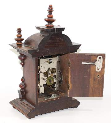 Bild Nr.4: 125-2893 Lenzkirch Tischuhr mit Walzenspielwerk.: (Uhren)