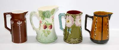 Bild Nr.2: 132-2196 Sieben Jugendstil Saftkrüge.: (Porzellan u. Keramik, Fayencen)